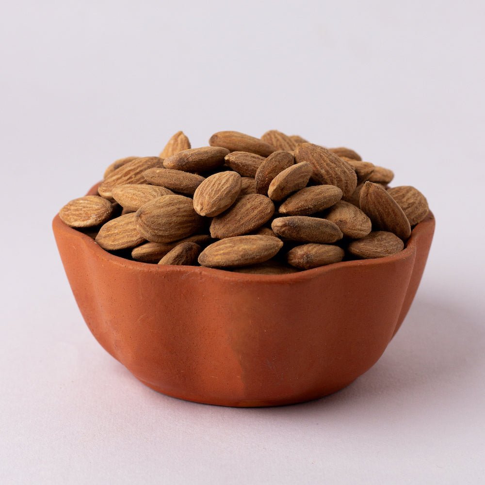 https://cdn.shopify.com/s/files/1/1857/6931/files/dry-roasted-salt-almond-490437.jpg?v=1762169093