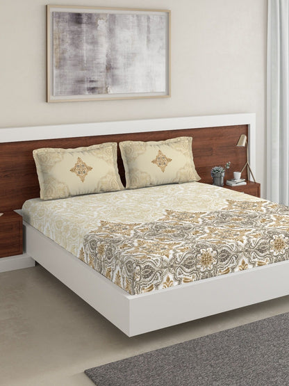 https://cdn.shopify.com/s/files/1/1857/6931/products/e1623e72-f674-4a6b-975c-49c3800ff90e1644433043634DDecorBeigeGreyEthnicMotifs180TCCotton1KingBedsheetwith2Pill1.jpg?v=1703244577