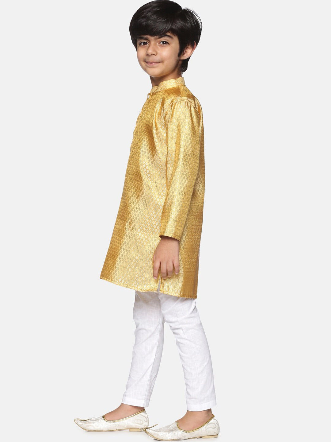 https://cdn.shopify.com/s/files/1/1857/6931/products/f09b2a57-a4c9-4b02-b122-c4efb8e7885e1639987424421SethukrishnaBoysGold-TonedKurtawithPyjamas4.jpg?v=1661582574