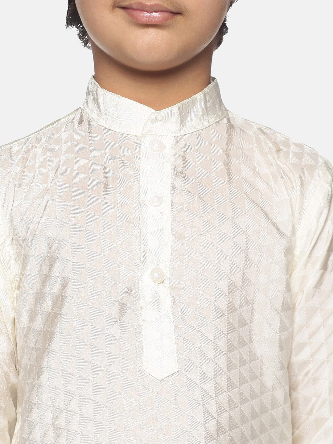https://cdn.shopify.com/s/files/1/1857/6931/products/f50f3019-da42-4310-9058-4648c8bc408a1639986333631SethukrishnaBoysCream-ColouredKurtawithPyjamas2.jpg?v=1661582051