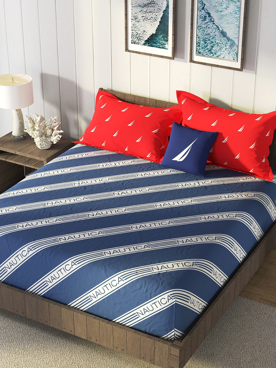 https://cdn.shopify.com/s/files/1/1857/6931/products/ff770954-aa96-444a-92ba-95909a7ca22f1683524352520NauticaBlueRedStripedCotton160TCKingBedsheetWith2PillowCover1.jpg?v=1703230045