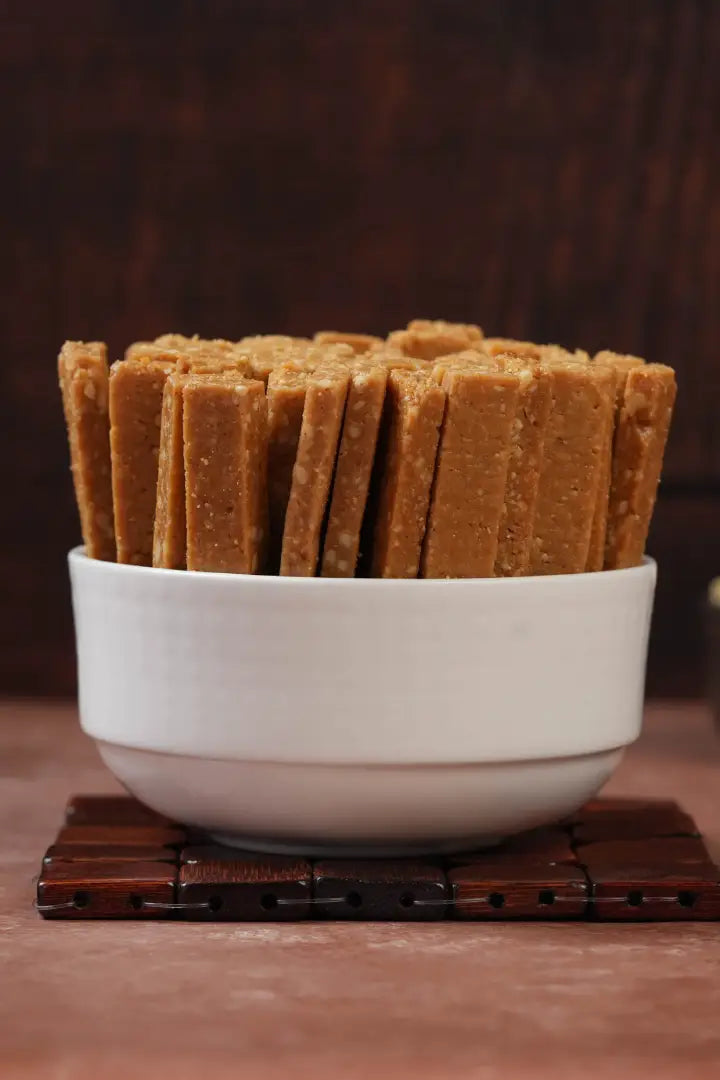 https://cdn.shopify.com/s/files/1/1857/6931/files/ghee-cashew-mittai_db2eb11c-354c-4a78-bb09-8d8f77ab5116.webp?v=1768912705