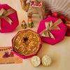 https://cdn.shopify.com/s/files/1/1857/6931/files/ghewar-hamper-pink-sweedesi-855519.jpg?v=1784881283