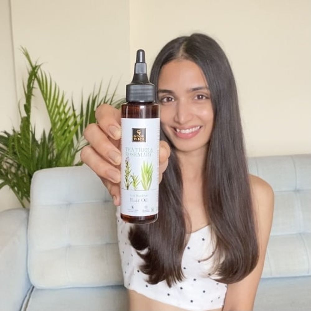 https://cdn.shopify.com/s/files/1/1857/6931/products/good-vibes-tea-tree-and-rosemary-anti-dandruff-hair-oil-100-ml_12_display_1627649694_2c6b9b93.jpg?v=1646386885