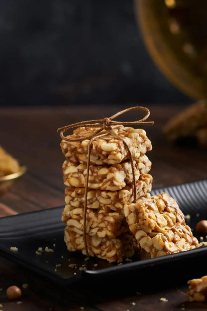 https://cdn.shopify.com/s/files/1/1857/6931/files/groundnut-chikki-bar.webp?v=1768912763