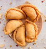 https://cdn.shopify.com/s/files/1/1857/6931/files/gujiya-864525.jpg?v=1762168818