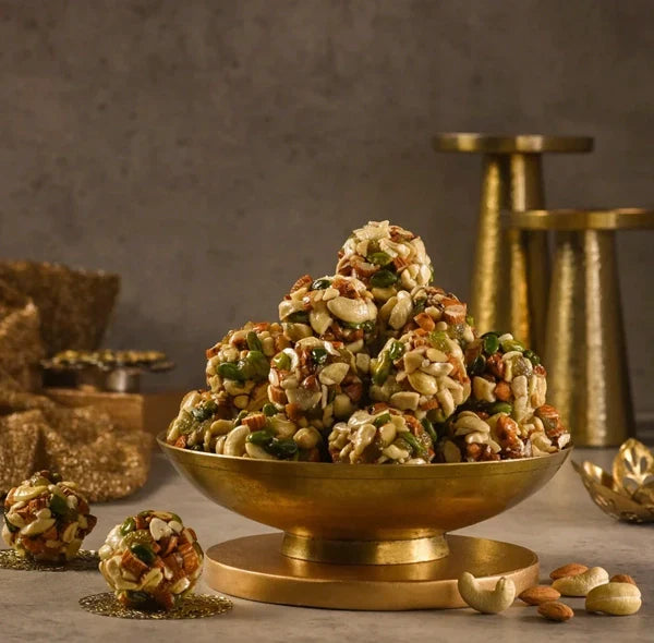 https://cdn.shopify.com/s/files/1/1857/6931/files/honey-dry-fruits-laddoo.webp?v=1763122678
