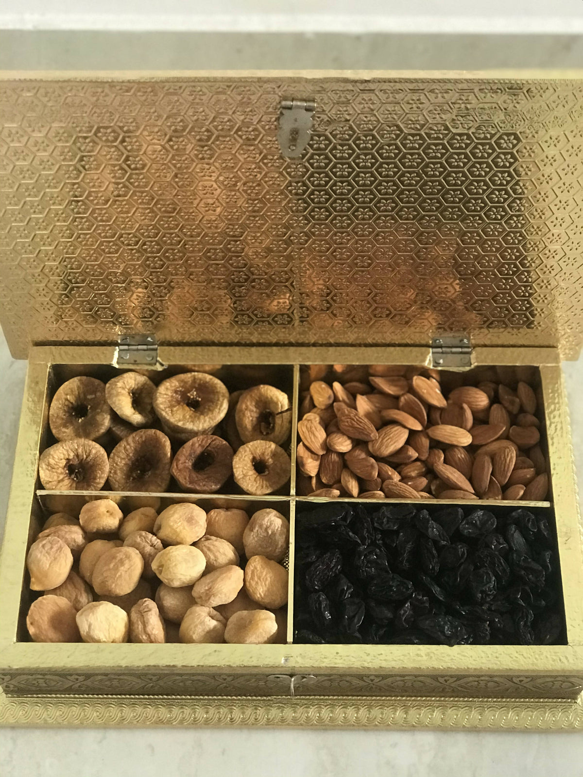 Image 1 of Gift Box for the product SK Mithaii | Assorted Rajasthani Elephant Design Dry Fruit Box | Almonds | Apricots | Figs | Black Resins |4 Partition