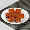 https://cdn.shopify.com/s/files/1/1857/6931/files/kaju-choco-burfi-364560.jpg?v=1762169393