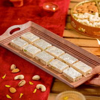 https://cdn.shopify.com/s/files/1/1857/6931/files/kaju-dry-fruit-burfi-773541.jpg?v=1762169384