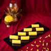 https://cdn.shopify.com/s/files/1/1857/6931/files/kaju-lemon-roll-640357.jpg?v=1762168865