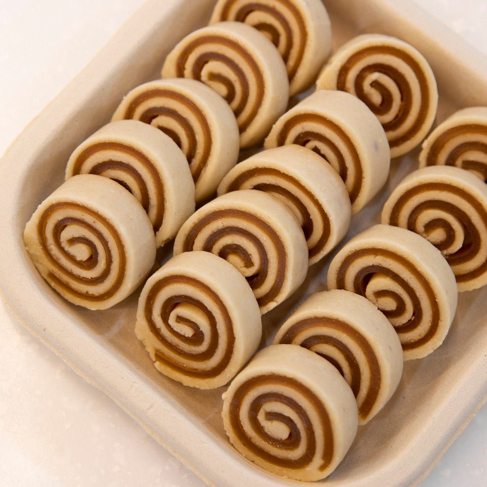 https://cdn.shopify.com/s/files/1/1857/6931/files/kaju-mango-roll-505558.jpg?v=1762169102