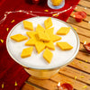 https://cdn.shopify.com/s/files/1/1857/6931/files/kesar-kaju-katli-308695.jpg?v=1762168998
