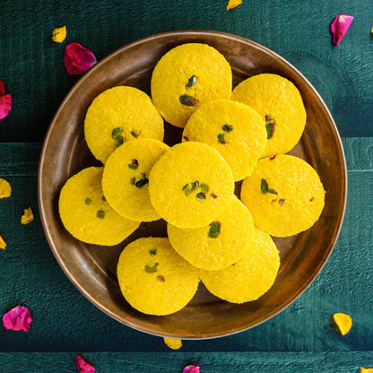 https://cdn.shopify.com/s/files/1/1857/6931/files/kesar-peda-702328.jpg?v=1762168953