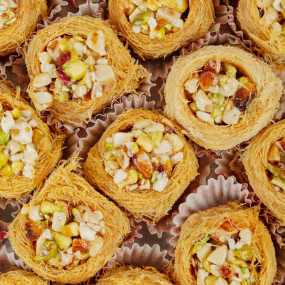 https://cdn.shopify.com/s/files/1/1857/6931/files/mixed-dry-fruit-nest-kunafa-7709608.jpg?v=1762169138
