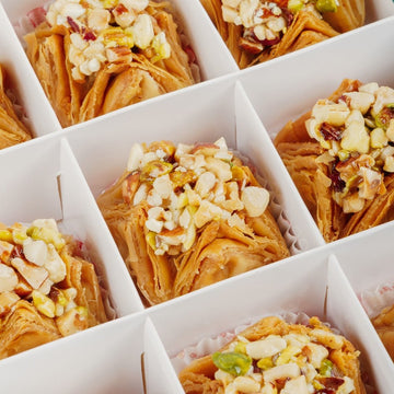 https://cdn.shopify.com/s/files/1/1857/6931/files/mixed-dry-fruit-pyramid-baklava-5339603.jpg?v=1762169190