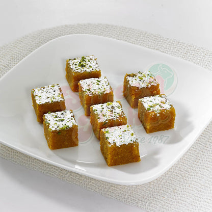 https://cdn.shopify.com/s/files/1/1857/6931/files/moong-dhal-burfi-665546.jpg?v=1762169326