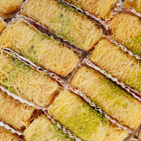 https://cdn.shopify.com/s/files/1/1857/6931/files/pistachio-finger-kunafa-6423777.jpg?v=1762168901