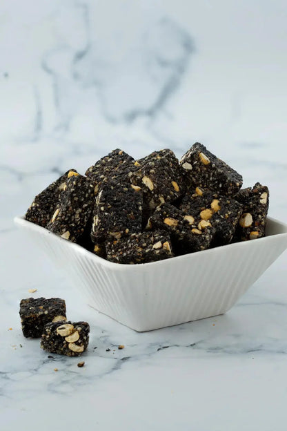 https://cdn.shopify.com/s/files/1/1857/6931/files/sattur-black-sesame-chikki.webp?v=1768912781