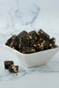 https://cdn.shopify.com/s/files/1/1857/6931/files/sattur-black-sesame-chikki.webp?v=1768912781
