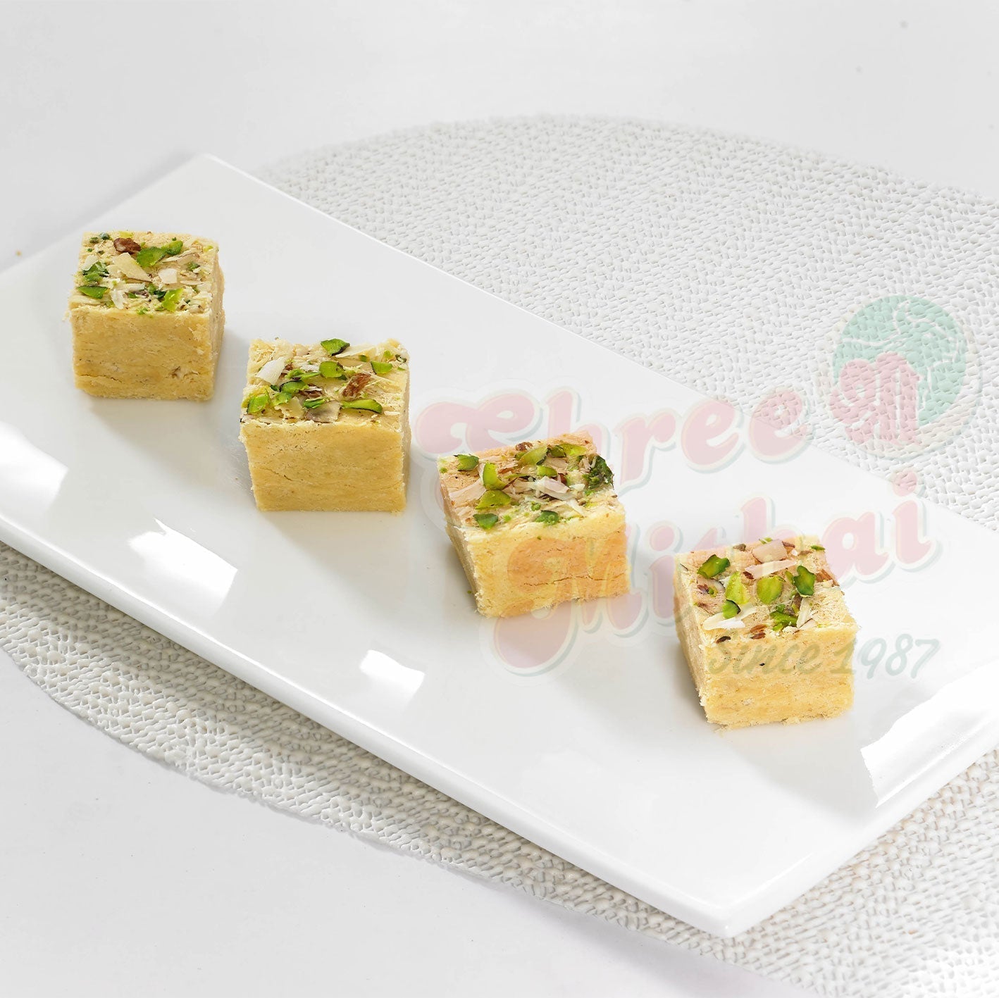 https://cdn.shopify.com/s/files/1/1857/6931/files/soan-papdi-457295.jpg?v=1762169648