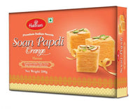 https://cdn.shopify.com/s/files/1/1857/6931/products/soan_papdi_orange_500g.jpg?v=1671714988
