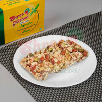 https://cdn.shopify.com/s/files/1/1857/6931/files/sugarfree-dry-fruit-chikki-282653.jpg?v=1762169496
